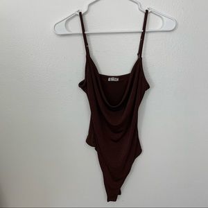 Slouchy burgundy bodysuit from FP